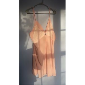 plus size pink mini dress with white lace and black bow <3